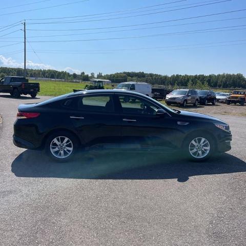 Photo of 2018 Ebony Black Kia Optima