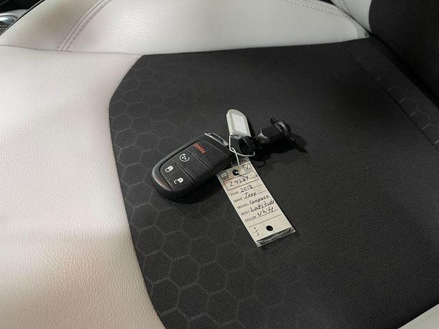 Photo of 2018 White Clearcoat Jeep Compass