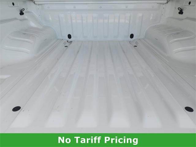 Photo of 2025 Glacier White Nissan Frontier