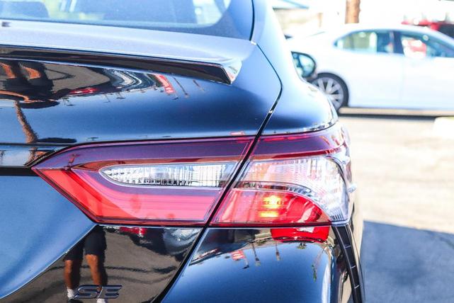 Photo of 2023 Midnight Black Metallic Toyota Camry
