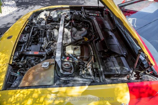 Photo of 1986 Black / Red Porsche 944