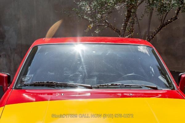 Photo of 1986 Black / Red Porsche 944
