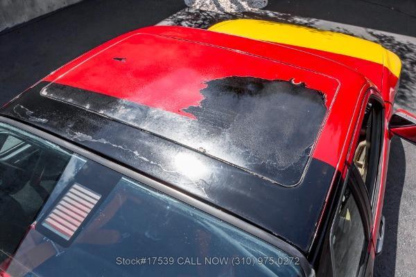 Photo of 1986 Black / Red Porsche 944