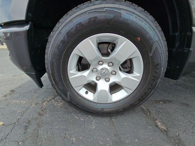 Photo of 2024 Granite Crystal Clearcoat Metallic RAM 1500