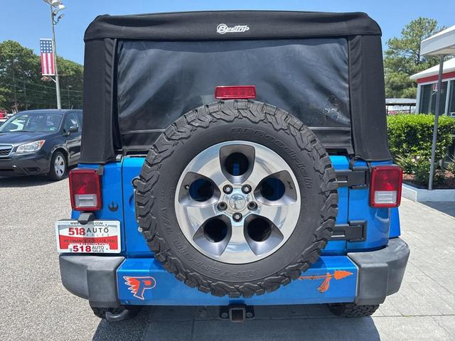 Photo of 2016 Hydro Blue Pearl Coat Jeep Wrangler Unlimited