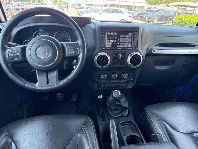 Photo of 2016 Hydro Blue Pearl Coat Jeep Wrangler Unlimited