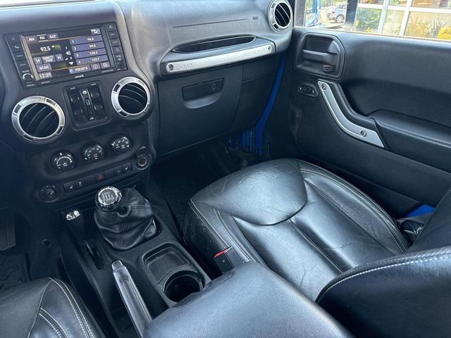Photo of 2016 Hydro Blue Pearl Coat Jeep Wrangler Unlimited
