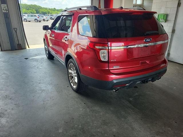 Photo of 2012 Red Candy Metallic Tinted Clearcoat Ford Explorer