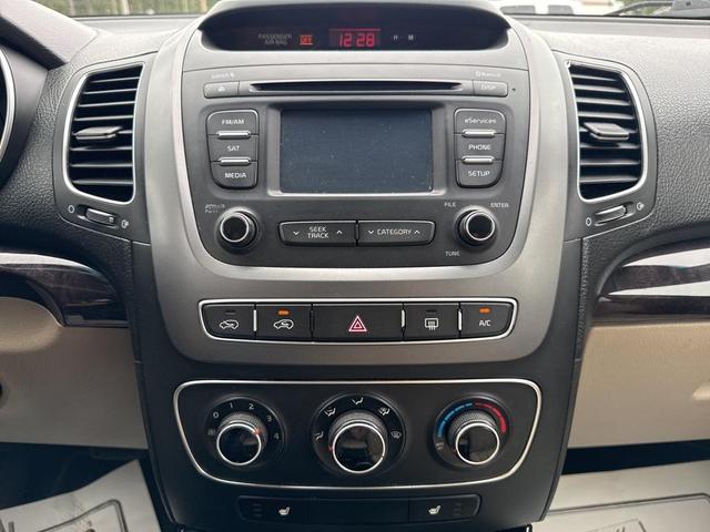 Photo of 2014 Remington Red Metallic Kia Sorento