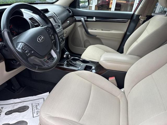 Photo of 2014 Remington Red Metallic Kia Sorento