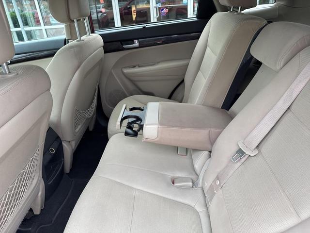 Photo of 2014 Remington Red Metallic Kia Sorento