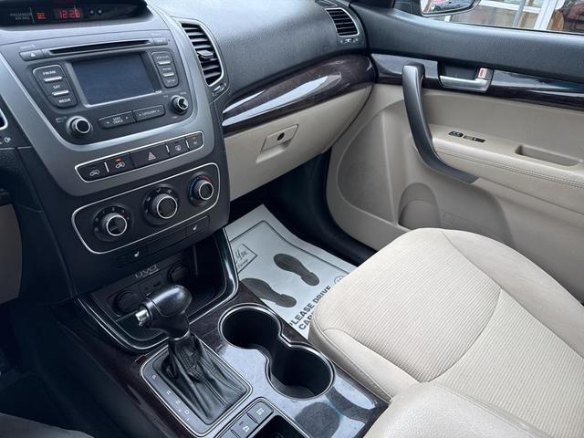 Photo of 2014 Remington Red Metallic Kia Sorento