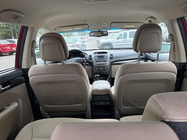 Photo of 2014 Remington Red Metallic Kia Sorento