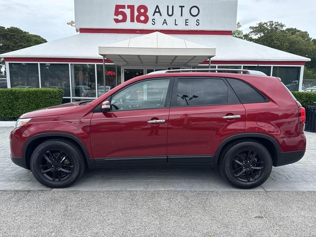 Photo of 2014 Remington Red Metallic Kia Sorento