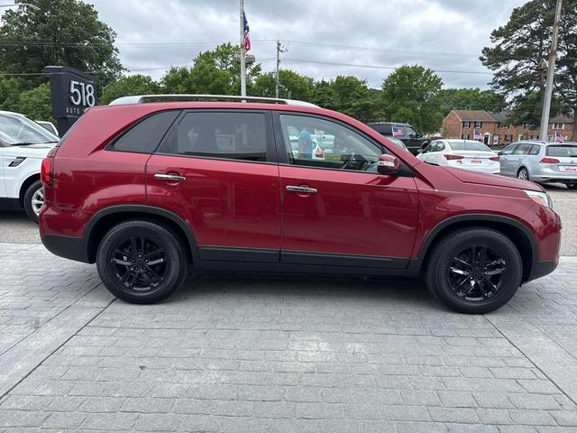 Photo of 2014 Remington Red Metallic Kia Sorento
