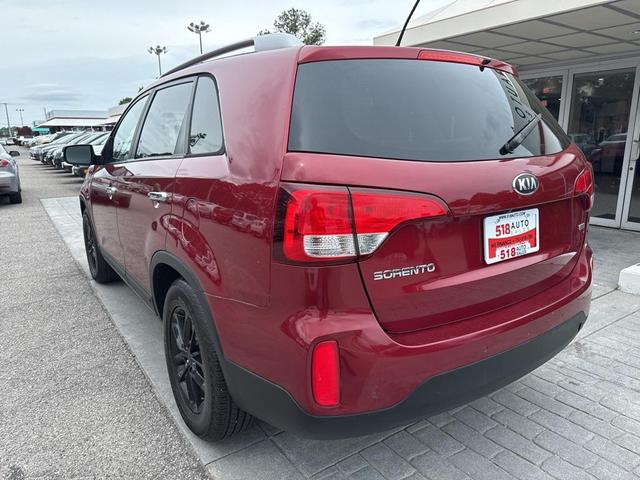 Photo of 2014 Remington Red Metallic Kia Sorento