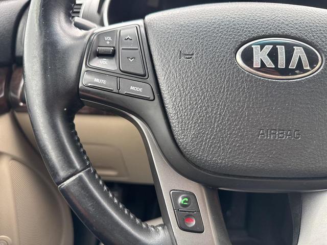 Photo of 2014 Remington Red Metallic Kia Sorento