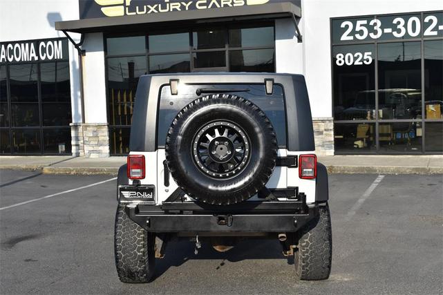 Photo of 2010 Stone White Clearcoat Jeep Wrangler Unlimited