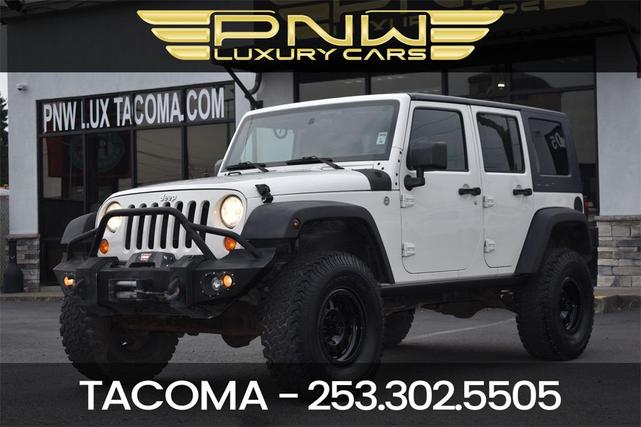 Photo of 2010 Stone White Clearcoat Jeep Wrangler Unlimited