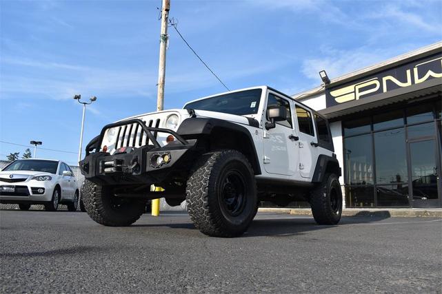 Photo of 2010 Stone White Clearcoat Jeep Wrangler Unlimited