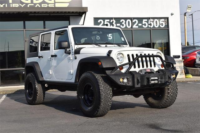 Photo of 2010 Stone White Clearcoat Jeep Wrangler Unlimited