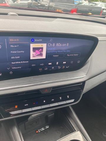 Photo of 2025 Brilliant Red Buick Envision