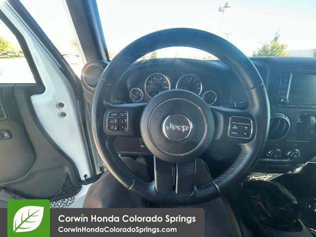 Photo of 2016 Bright White Clearcoat Jeep Wrangler