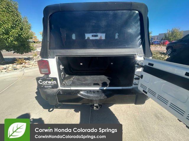 Photo of 2016 Bright White Clearcoat Jeep Wrangler