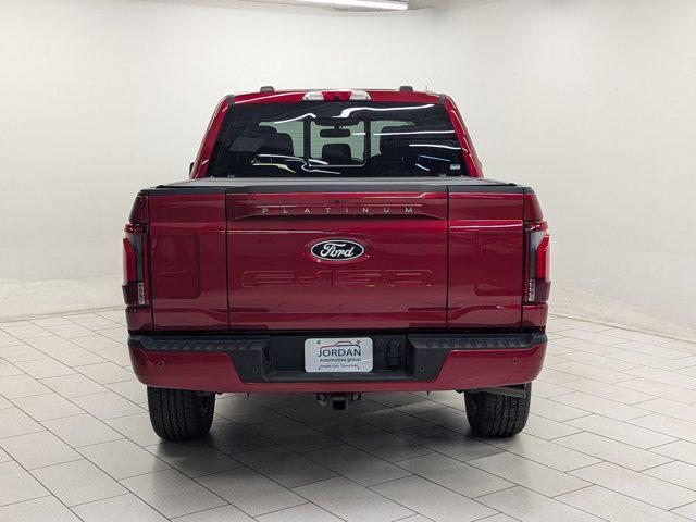 Photo of 2025 RAPID RED MET TINTED CC Ford F-150