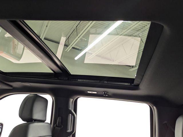 Photo of 2025 RAPID RED MET TINTED CC Ford F-150