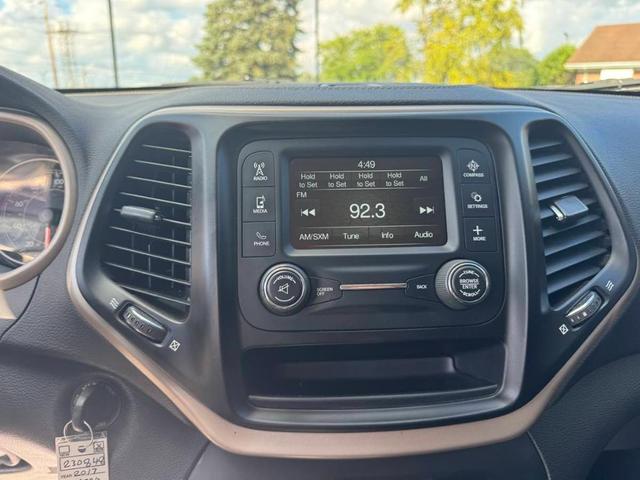 Photo of 2017 Deep Cherry Red Crystal Pearlcoat Jeep Cherokee