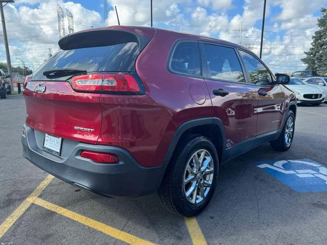 Photo of 2017 Deep Cherry Red Crystal Pearlcoat Jeep Cherokee