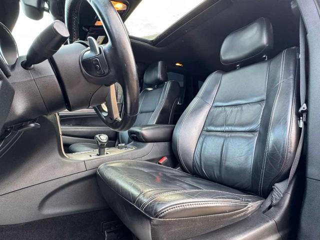 Photo of 2015 Deep Cherry Red Crystal Pearlcoat Jeep Grand Cherokee