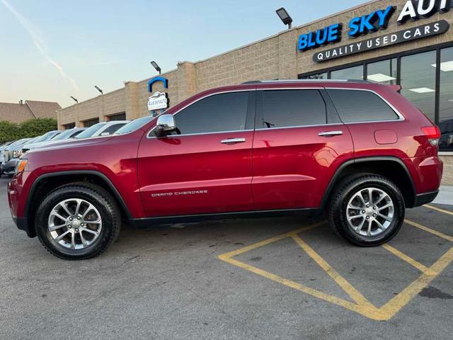 Photo of 2015 Deep Cherry Red Crystal Pearlcoat Jeep Grand Cherokee