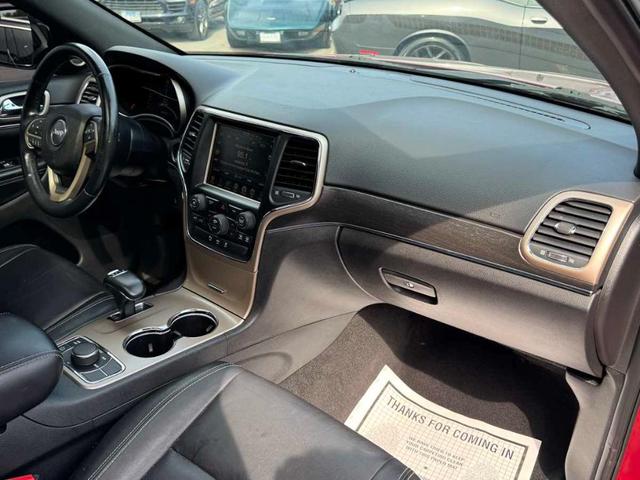 Photo of 2015 Deep Cherry Red Crystal Pearlcoat Jeep Grand Cherokee