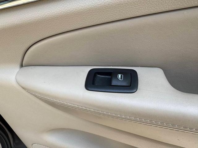 Photo of 2017 Luxury Brown Pearlcoat Jeep Grand Cherokee