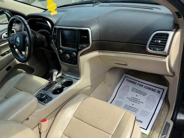 Photo of 2017 Luxury Brown Pearlcoat Jeep Grand Cherokee