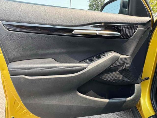 Photo of 2021 Starbright Yellow / Black Roof Kia Seltos