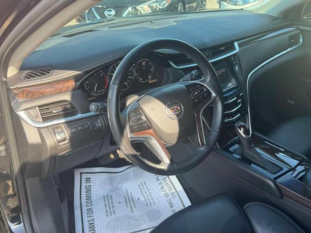 Photo of 2015 Black Raven Cadillac XTS