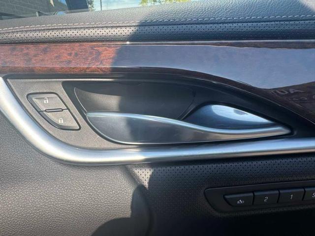 Photo of 2015 Black Raven Cadillac XTS