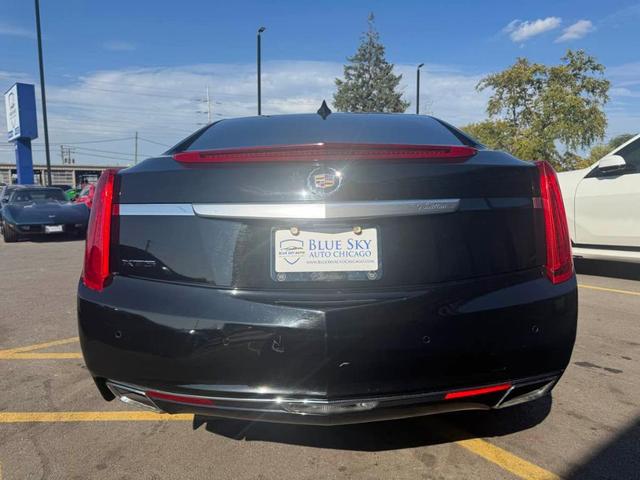 Photo of 2015 Black Raven Cadillac XTS
