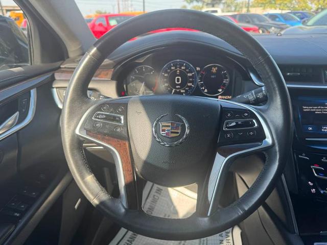 Photo of 2015 Black Raven Cadillac XTS