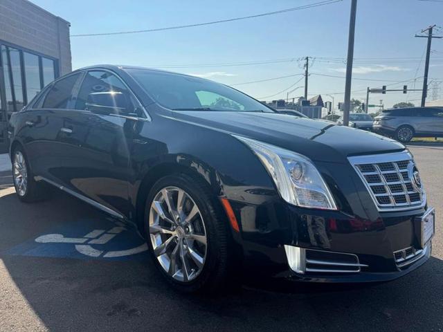 Photo of 2015 Black Raven Cadillac XTS