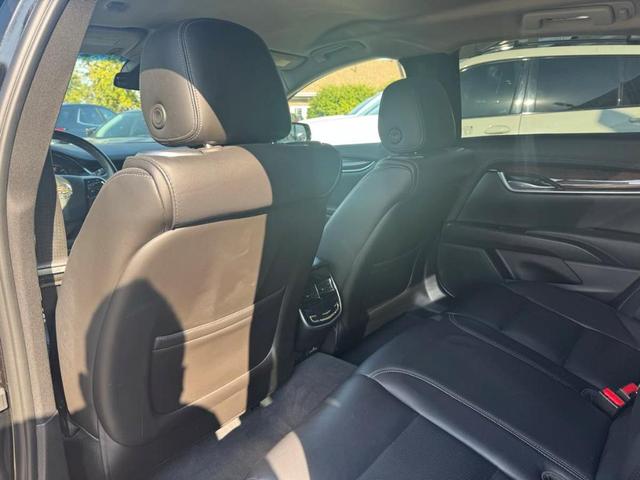 Photo of 2015 Black Raven Cadillac XTS