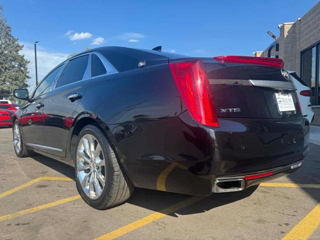 Photo of 2015 Black Raven Cadillac XTS