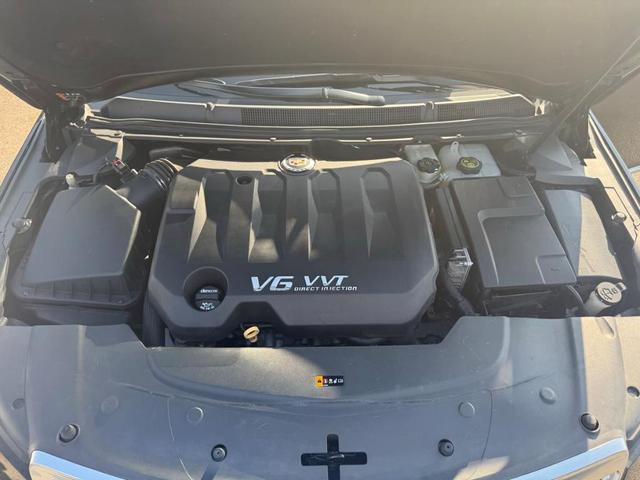 Photo of 2015 Black Raven Cadillac XTS