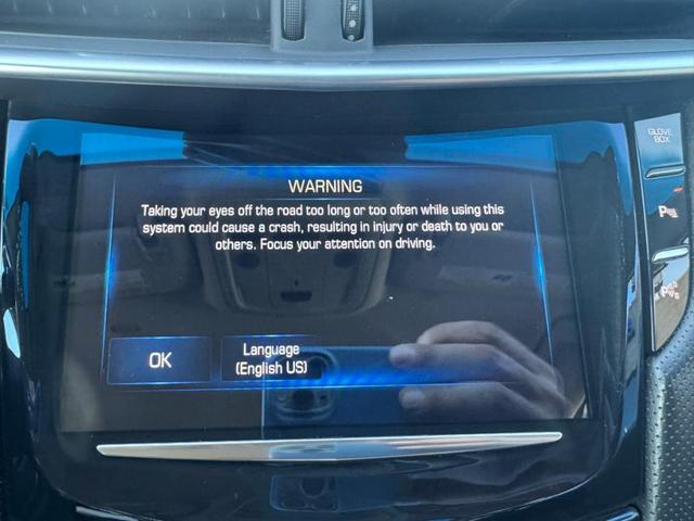 Photo of 2015 Black Raven Cadillac XTS