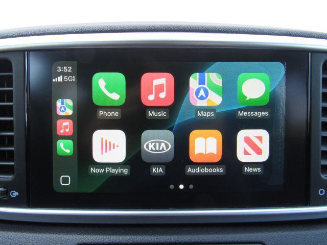 Photo of 2021 Black Cherry Kia Sportage