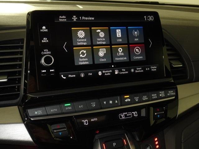 Photo of 2025 Radiant Red Metallic II Honda Odyssey