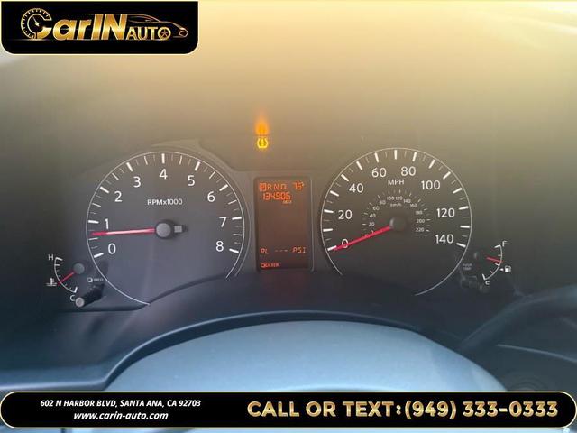 Photo of 2016 Brilliant Silver Metallic Nissan NV Passenger NV3500 HD